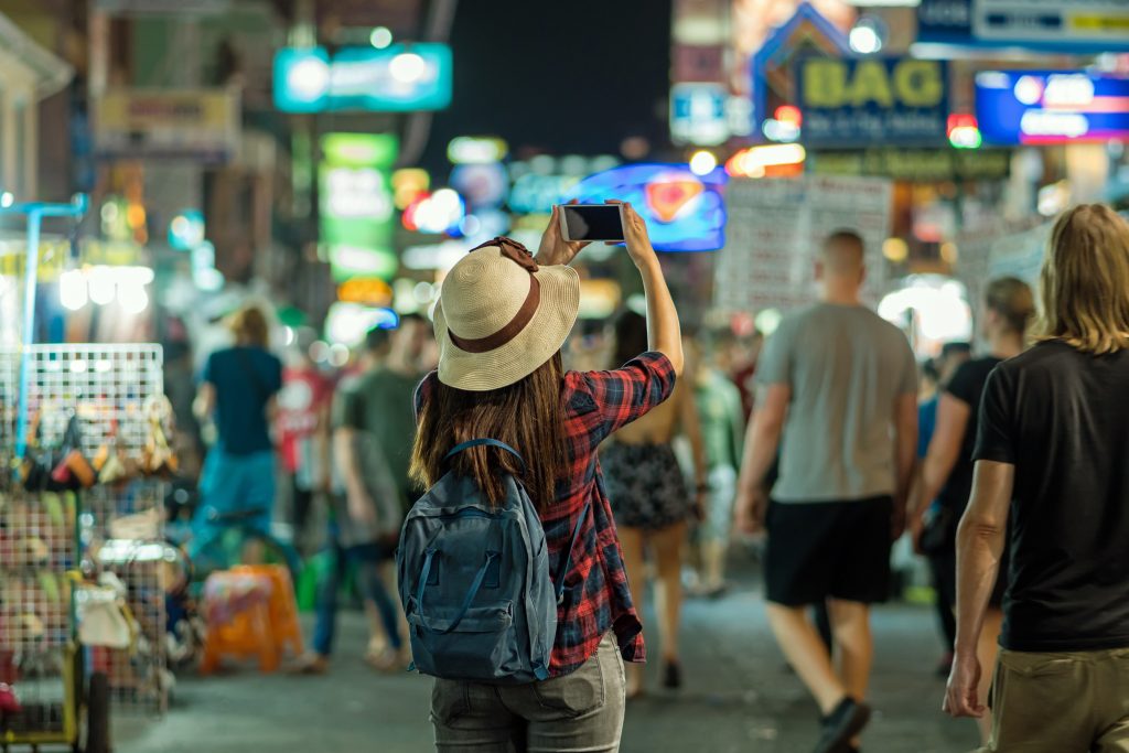 Woman taking photos on Khao San Road